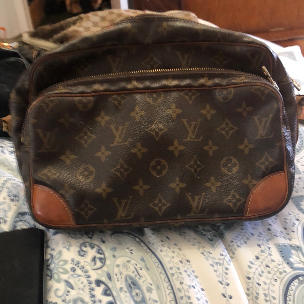 Authentic Louis Vuitton double pouch shoulder bag